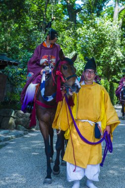 Kyoto - 15 Mayıs: Kyoto, Japonya üzerinde 15 Mayıs 2018 Aoi Matsuri katılımcılar. AOI Mastsuri tarihlerinde Kyoto, Japonya'da üç ana yıllık festivaller biridir