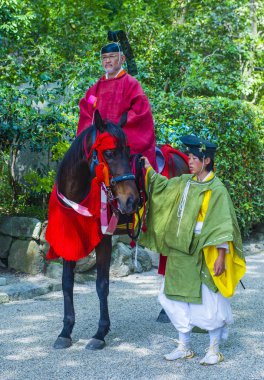 Kyoto - 15 Mayıs: Kyoto, Japonya üzerinde 15 Mayıs 2018 Aoi Matsuri katılımcılar. AOI Mastsuri tarihlerinde Kyoto, Japonya'da üç ana yıllık festivaller biridir