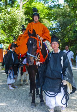 Kyoto - 15 Mayıs: Kyoto, Japonya üzerinde 15 Mayıs 2018 Aoi Matsuri katılımcılar. AOI Mastsuri tarihlerinde Kyoto, Japonya'da üç ana yıllık festivaller biridir
