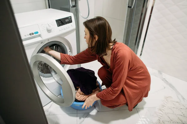 Young Woman Takes Washed Clothes Out Washing Machine — Stock Photo, Image