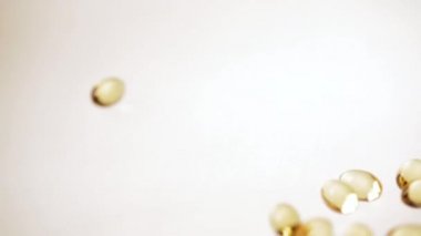 Omega 3 altın balık yağı kapsülleri, rotasyon arka plan