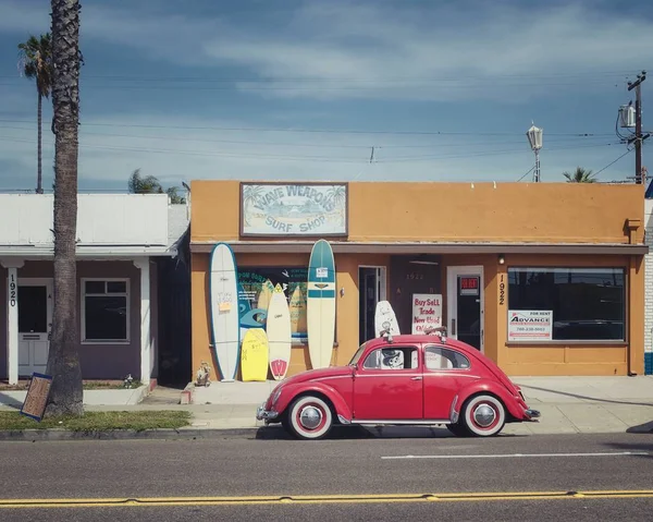 City Surf shop and car