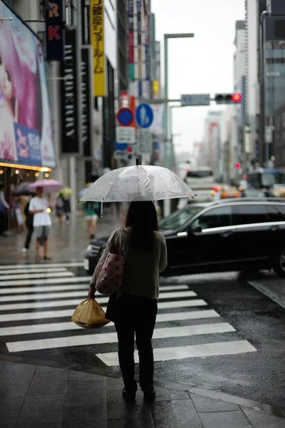 A girl Crossing the Road