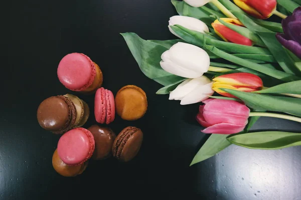 close up of  Macaroons with tulip flowers