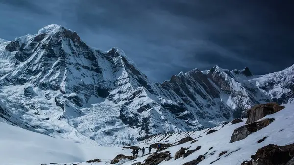 Climbers mountain with snow