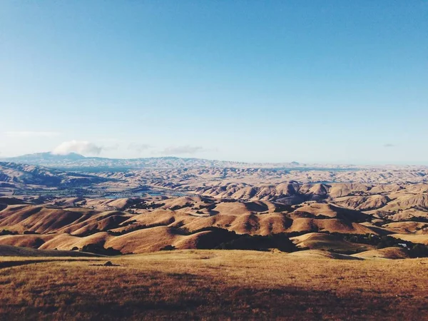 nature of a curvy mountains  at day time