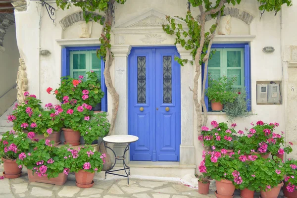 Door with Flower and Windows in Tinos Island of Greece