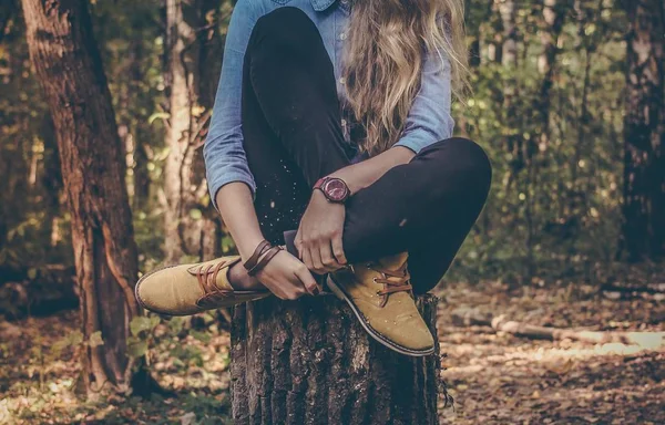 Pose of girl in the woods