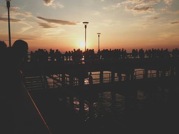 People on the Dock