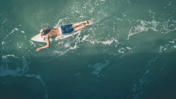 Surfer on board