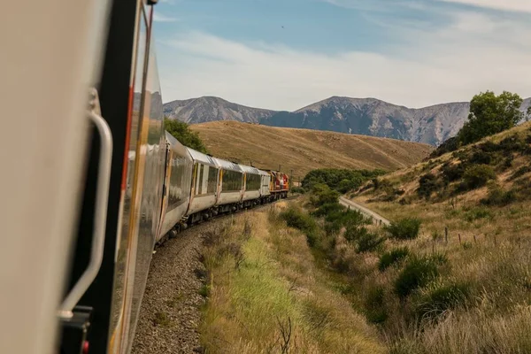 Train Travel in green  landscape  at day time