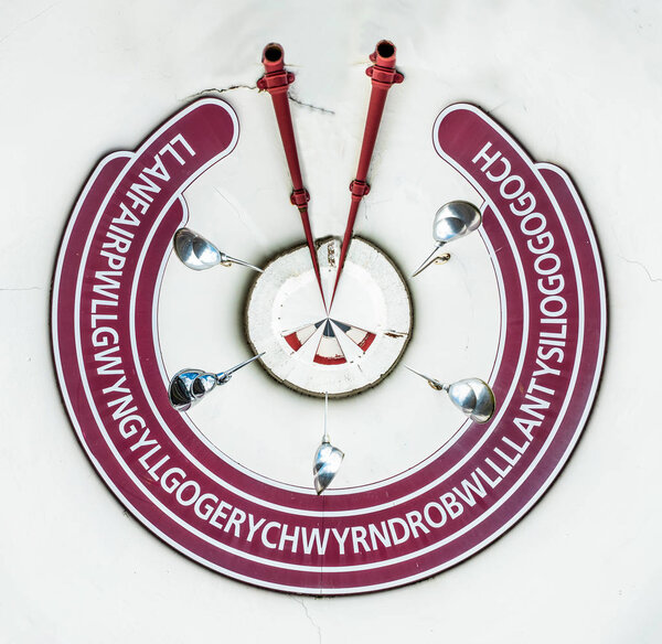 The longest place name of the UK, llanfairpwllgwyngyllgogerychwyrndrobwllllantysiliogogogogogoch on the public train station
