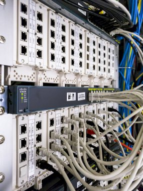 Leverkusen , Germany - September 06 2018 : Industrial ethernet network switch is working while green light are flashing clipart