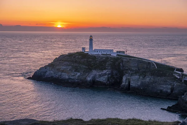 Naplemente a Dél verem világítótorony, Anglesey, Wales — Stock Fotó