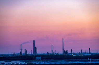 Hull , England - May 04 2018 : Passing by the industrial skyline close to Hull - United Kingdom clipart