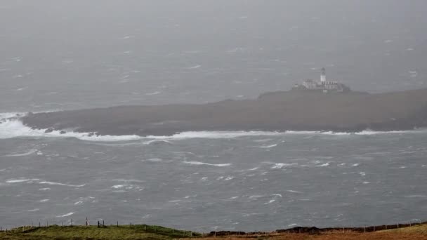 Unusual view of Neist Point with Lighthouse on the Isle of Skye during storm Callum in autumn — Stock Video