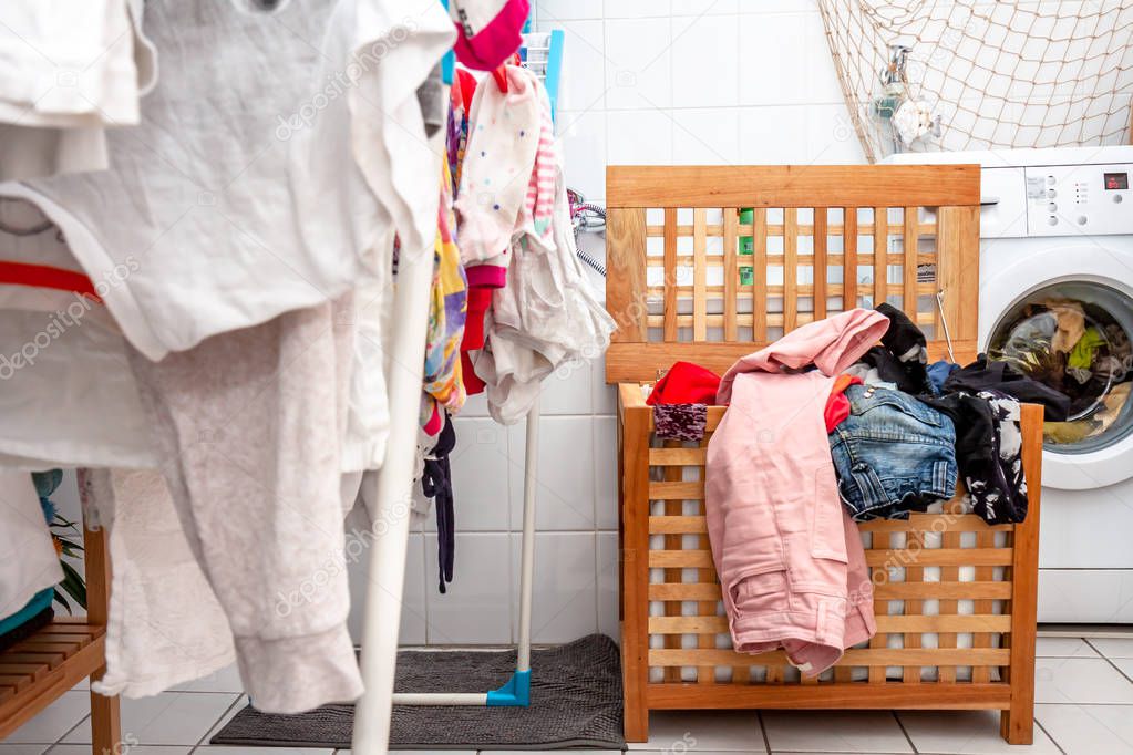 Huge amount of laundry drying in the bathroom