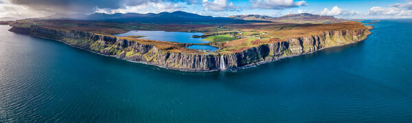Aerial view of the dramatic coastline at the cliffs by Staffin with the famous Kilt Rock waterfall - Isle of Skye - Scotland
