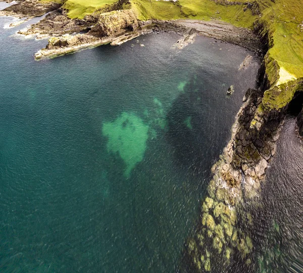 Aerial view of the Dinosaur bay with the rare Dinosaur footprint of the sauropod-dominated tracksite from Rubha nam Brathairean, Brothers Point - Isle of Skye, Scotland