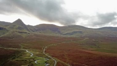 Flying over the River Lealt and Single track at Loch Cuithir and Sgurr a Mhadaidh Ruadh - Hill of the Red Fox, Isle of Skye, Scotland