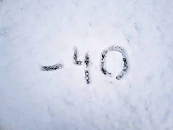 Temperature of -40 written in the freshly fallen snow — Stock Photo, Image
