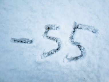 Kar içinde yazılı-55 sıcaklığını