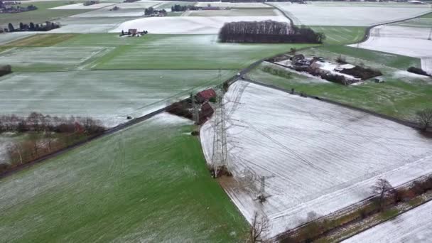 Aerial of high voltage power line pylon in the winter — Stock Video