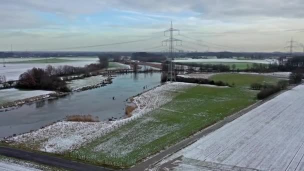 stock video The Schwafheimer sea is a nature conservation area in Moers in a former flood gutter of the river Rhine in Germany - Aerial view with the chimneys of Duisburg city in the background.