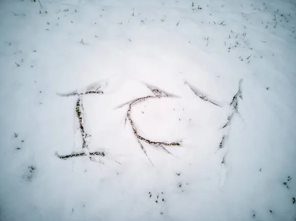 ICY escrito na neve recém-caída — Fotografia de Stock