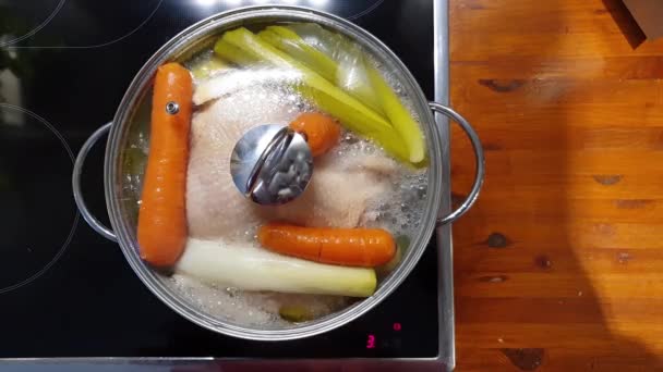 Vegetables and chicken cooking in a metal pot — Stock Video