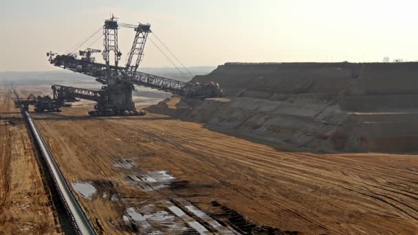 Bucket-wheel excavator in open-cast mining pit in Germany — Stock Video