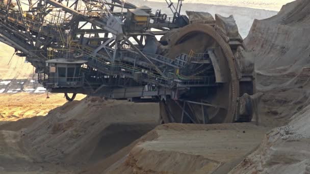 Bucket-wheel excavator in open-cast mining pit in Germany — Stock Video