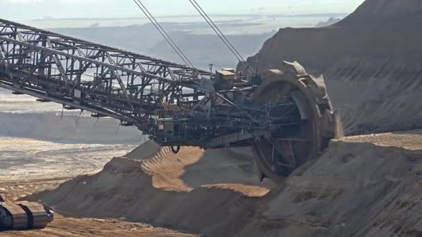 Bucket-wheel excavator in open-cast mining pit in Germany — Stock Video