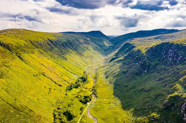 Aerial view of the Glenveagh National Park with castle Castle and Loch in the back looking towards Lettermacaward- County Donegal, Ireland — Stock Photo, Image