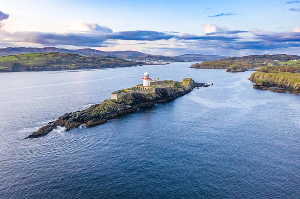 Aerial of the Rotten Island Lighthouse with Killybegs in background - County Donegal - Írország — Stock Fotó