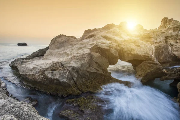 Sunset over rocky coast in Calabria — Stock Photo, Image