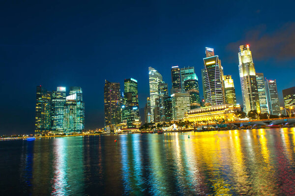 Evening photo of Singapore Downtown near city marina