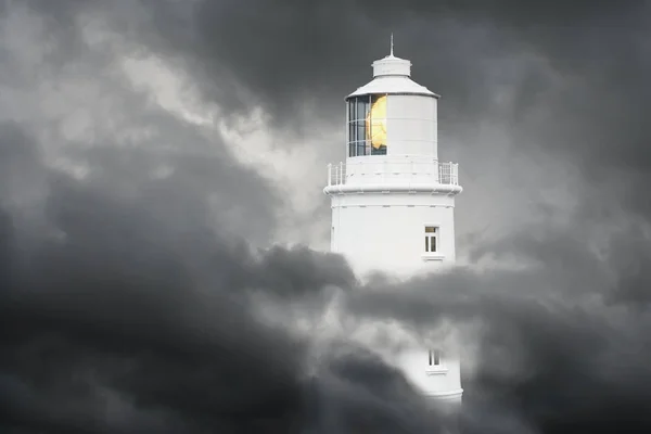Lighthouse in the clouds — Stock Photo, Image