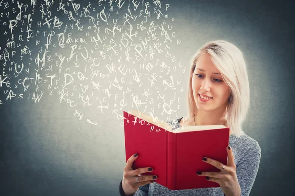 Beautiful Blonde Girl Read Flying Alphabet Letters Escape Red Book — Stock Photo, Image