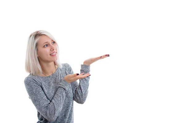 Beautiful Girl Holding Out Her Hands Showing Something Imaginary Isolated — Stock Photo, Image