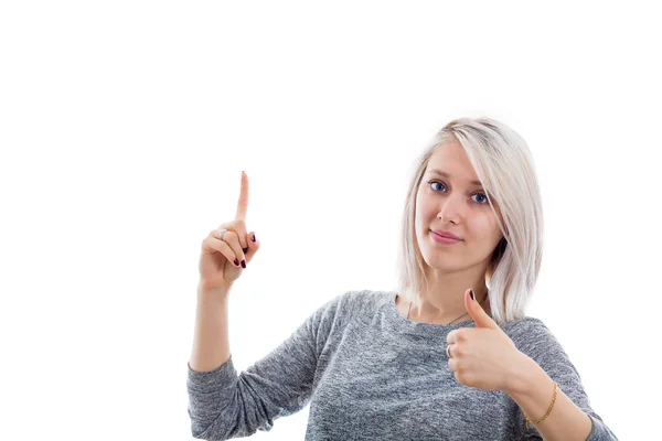 Энтузиастичная Молодая Женщина Показывает Большой Палец Вверх Жестом Одной Стороны — стоковое фото