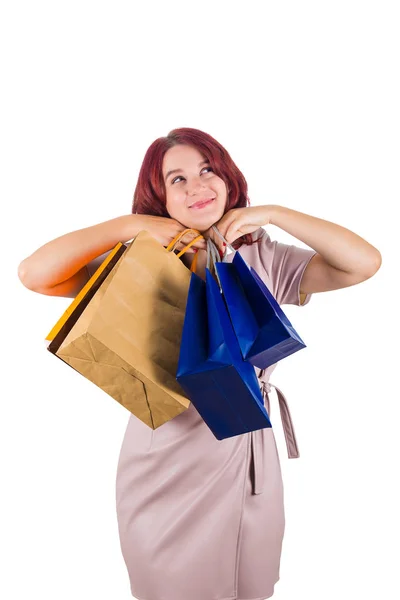 Joven Pelirroja Con Las Manos Bajo Barbilla Llevando Bolsas Compras —  Fotos de Stock