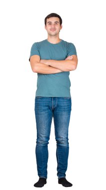 Casual adam silah geçti. Beyaz arka plan üzerinde izole kendine güvenen erkek portresi tam uzunlukta.