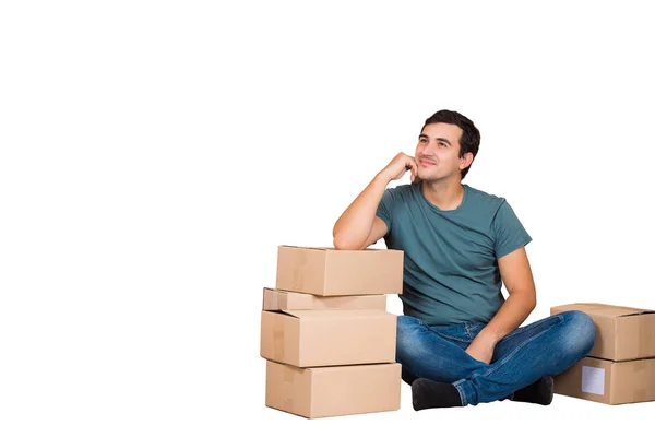 Full Length Portrait Pensive Young Man Sitting Leaning Cardboard Boxes — Stock Photo, Image