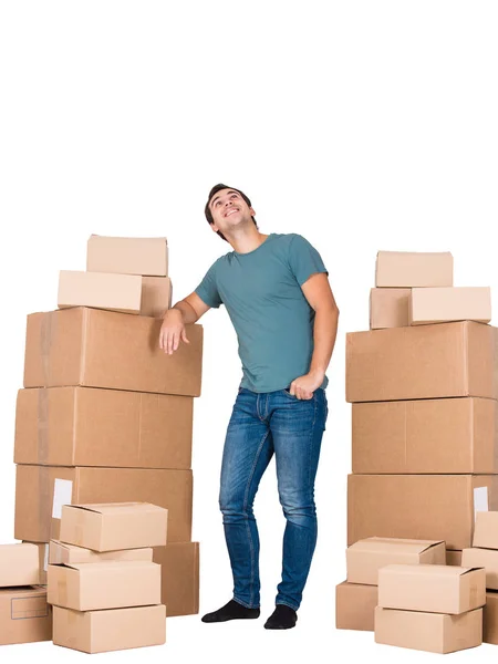 Full Length Portrait Young Man Leaning Cardboard Boxes Thoughtful Looking — Stock Photo, Image