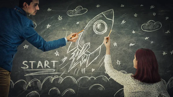 Man Woman Sharing Thoughts Together Drawing Rocket Start Blackboard Idea — Stock Photo, Image