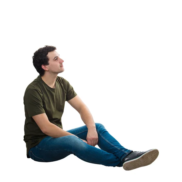 Расслабленный человек сидит на полу — стоковое фото