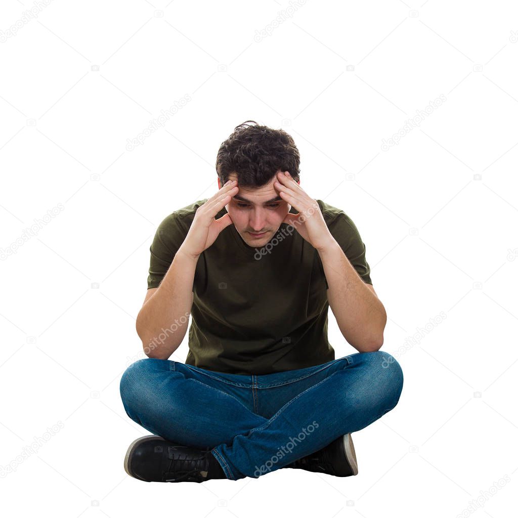 upset man sitting on the floor