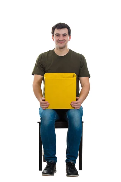 Pleased man holding box — Stock Photo, Image