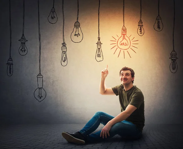 One bulb shine while others are switched off. Uniqueness of the — Stock Photo, Image